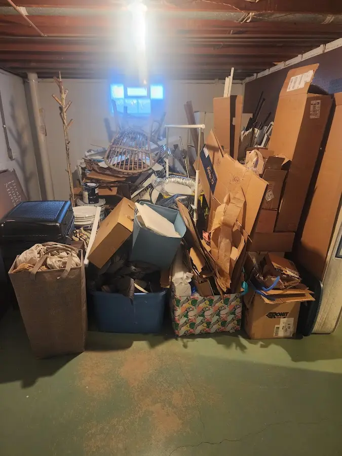 Roll-off dumpster container at job site for 2 Yard Dumpster Rental in King